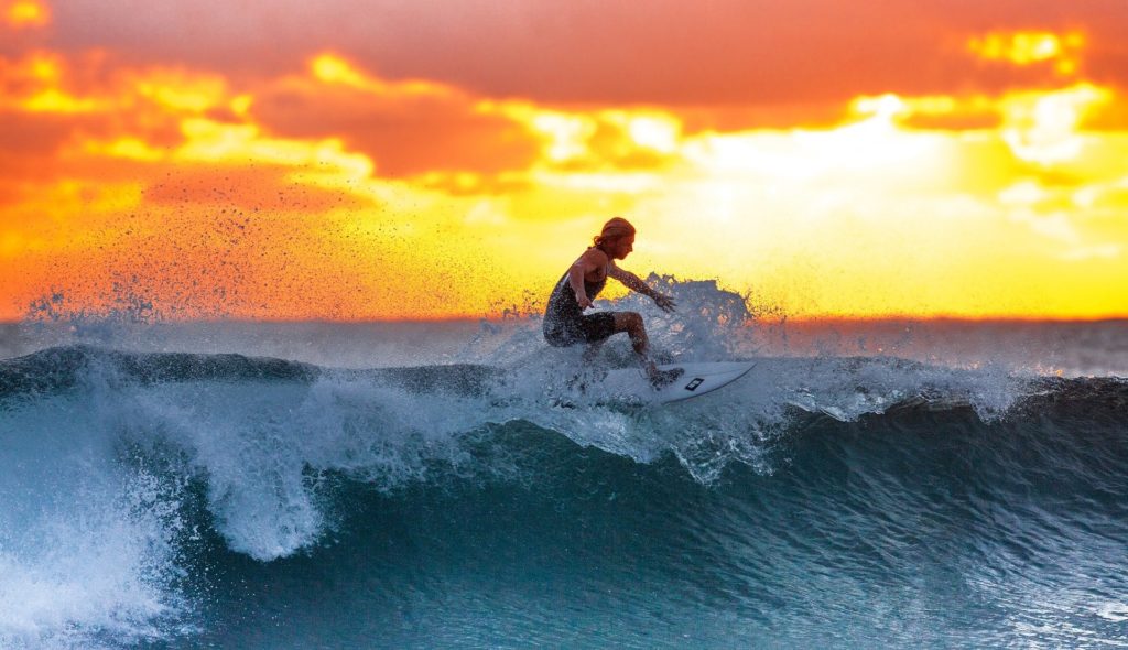 surfer at sunset in Tamarindo